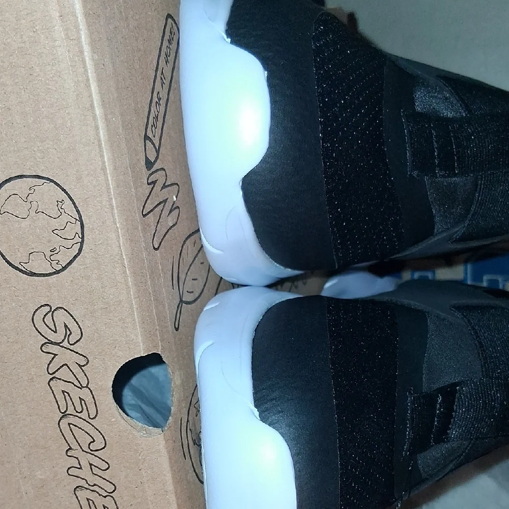 Skechers Boy’s Black and White Slip-On Athletic Sneakers